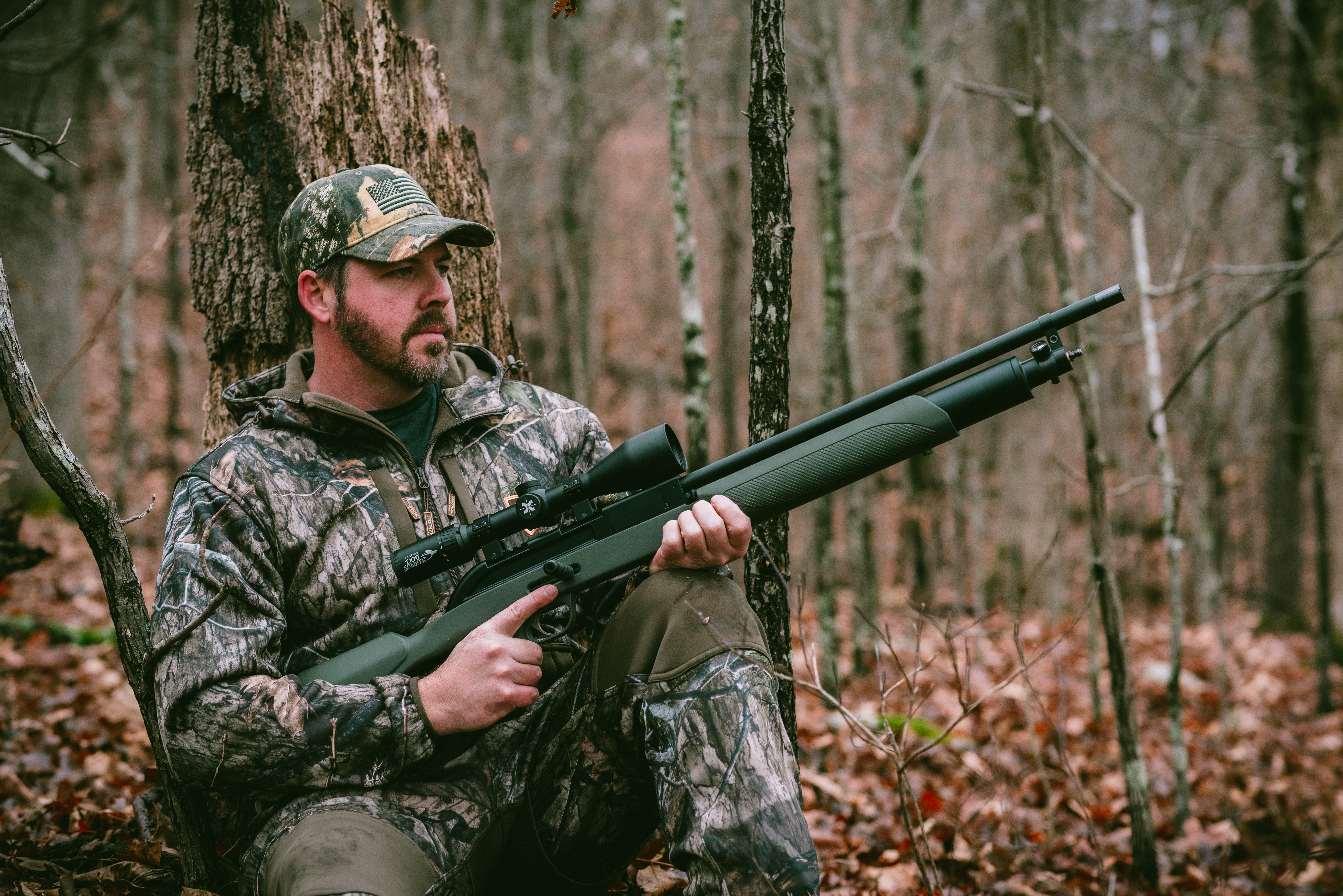 Hunter with Primal 20 shotgun turkey hunting